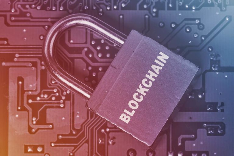 Blockchain - Technology that brings safety and reliability - blockchain padlock on a circuit